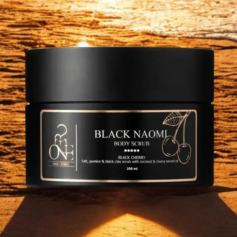 Black Naomi i kvällsljus – Skapa en lyxig spa-stämning hemma med denna eleganta svarta kroppsskrubb.